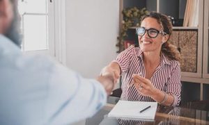 Job applicant shaking an interviewer's hand